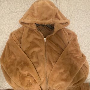 This is a lightweight soft two sided jacket with four pockets!